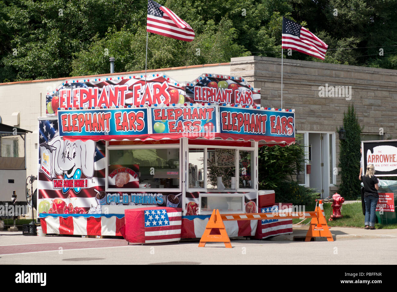 Food vendor set up on the street prior to the 2018 annual Cruz-In parade of antique and vintage vehicles through Montague, Michigan. Stock Photo