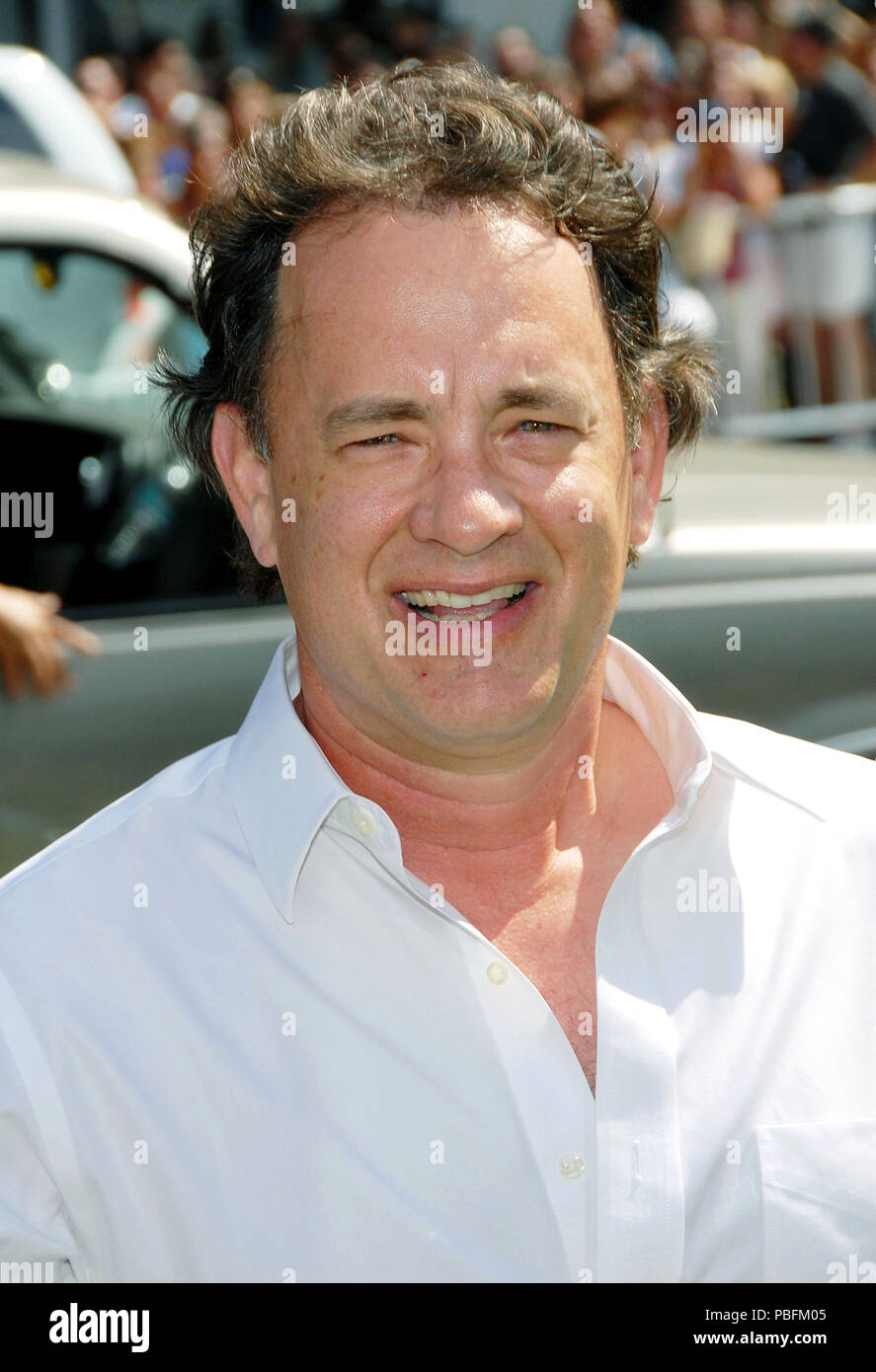 Tom Hanks arriving at the ANT BULLY Premiere at the Chinese Theatre In Los  Angeles. July 23, 2006. eye contact headshot smile01 HanksTom013 Red Carpet  Event, Vertical, USA, Film Industry, Celebrities, Photography,