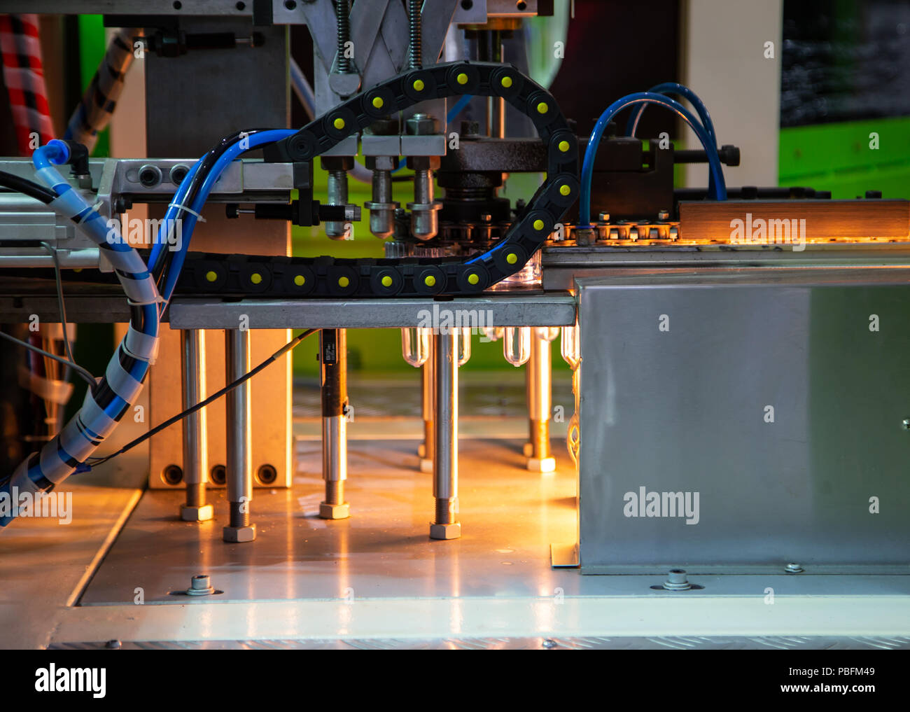 Heating process for plastic bottle blowing machine Stock Photo Alamy