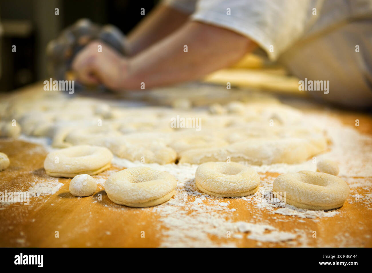 Fresh doughnuts made by hand Stock Photo Alamy