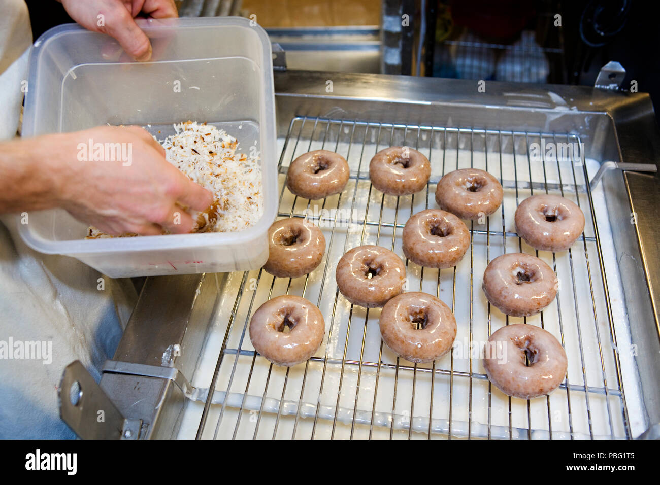 Fresh doughnuts made by hand Stock Photo Alamy