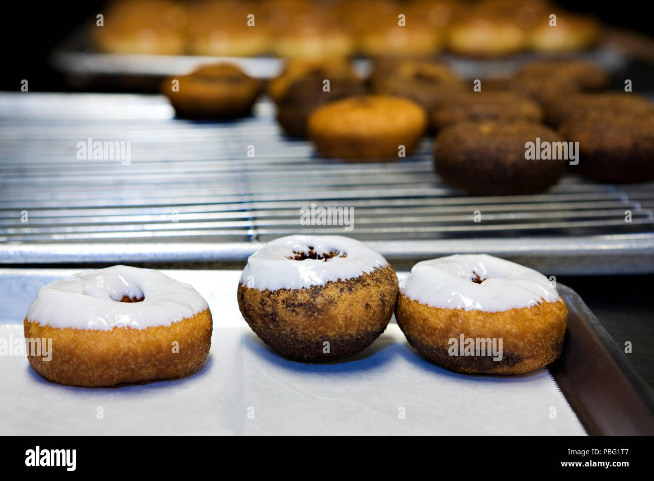 Fresh doughnuts made by hand Stock Photo Alamy