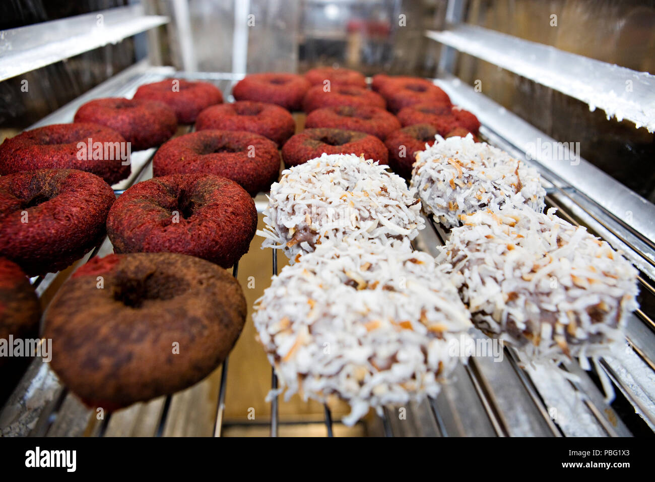 Fresh doughnuts made by hand Stock Photo Alamy