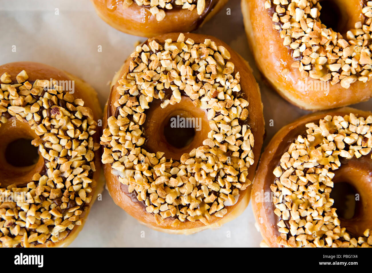 Fresh doughnuts made by hand Stock Photo Alamy