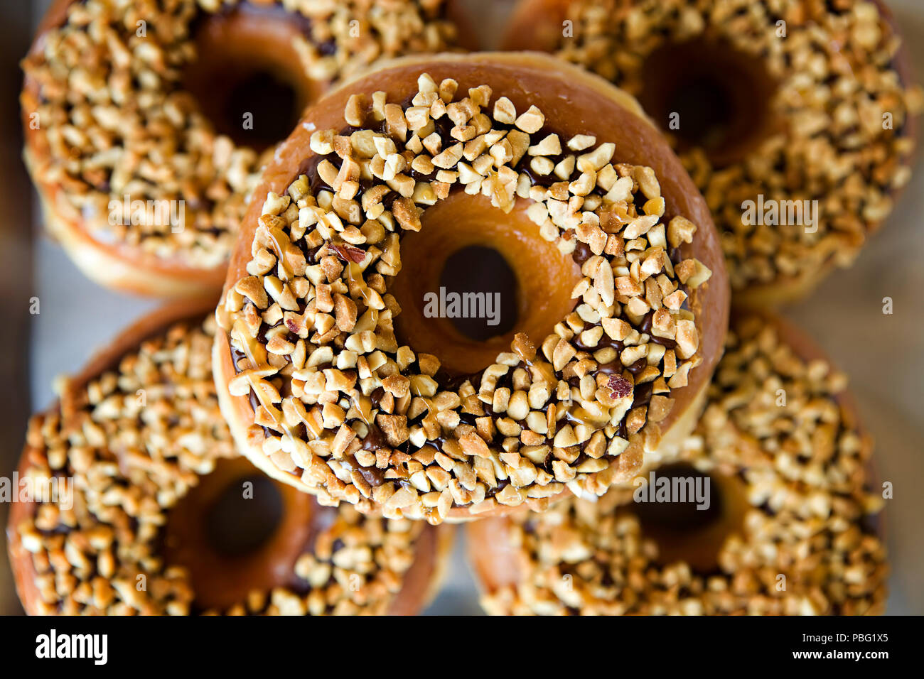 Fresh doughnuts made by hand Stock Photo Alamy