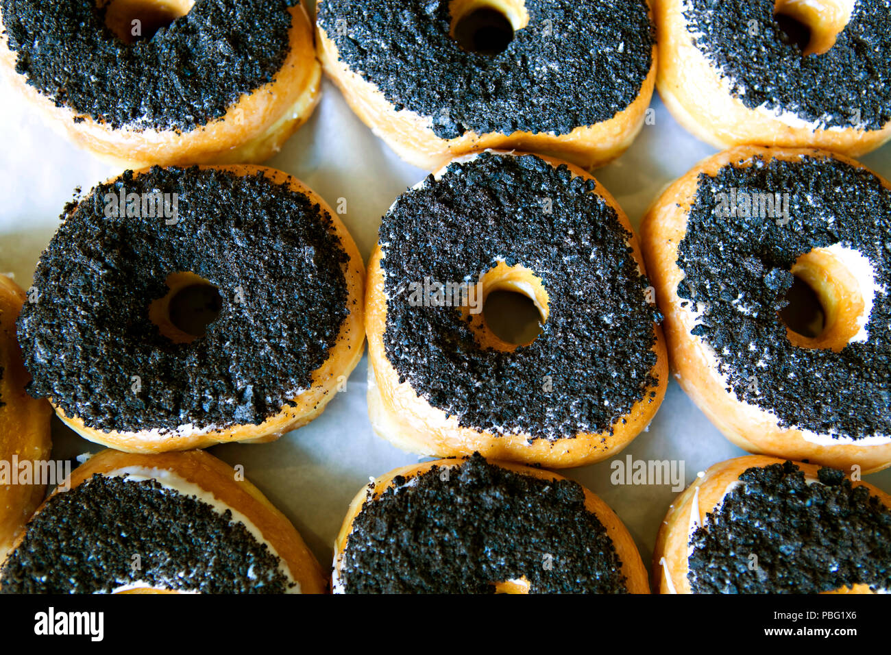 Fresh doughnuts made by hand Stock Photo Alamy