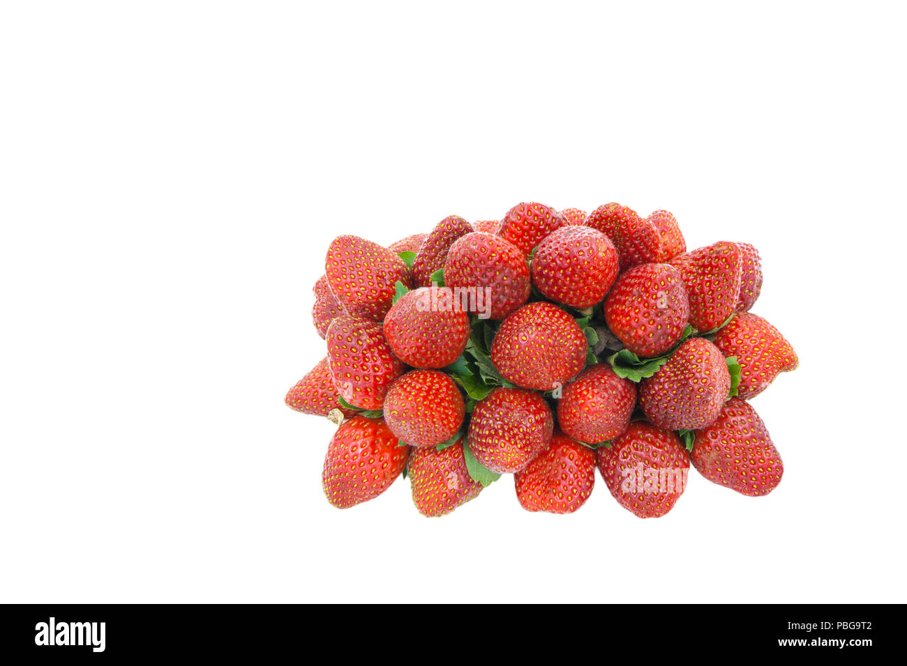 Pile strawberries isolated on a white background Stock Photo - Alamy