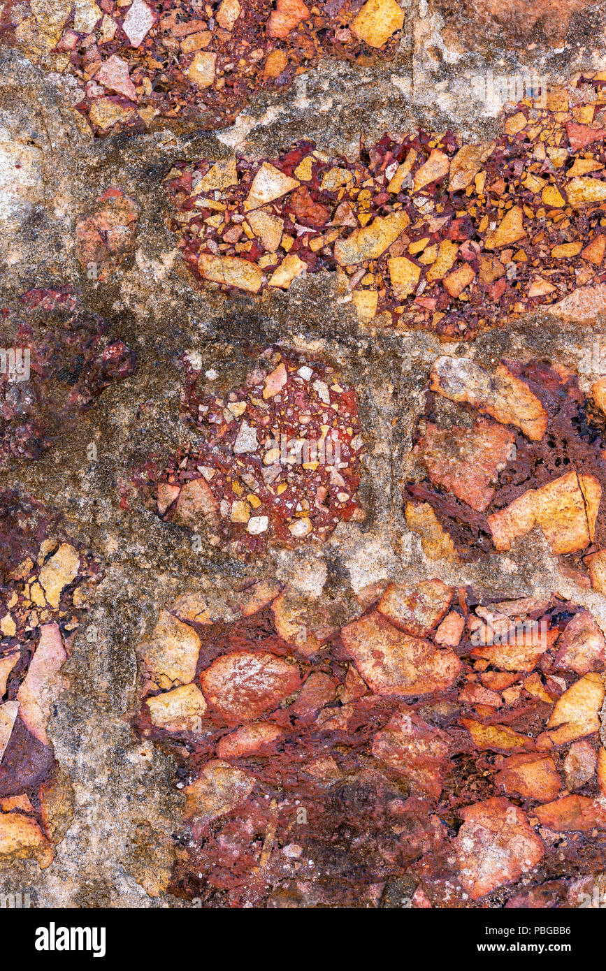 Cemented naural flint rough stone wall background Stock Photo