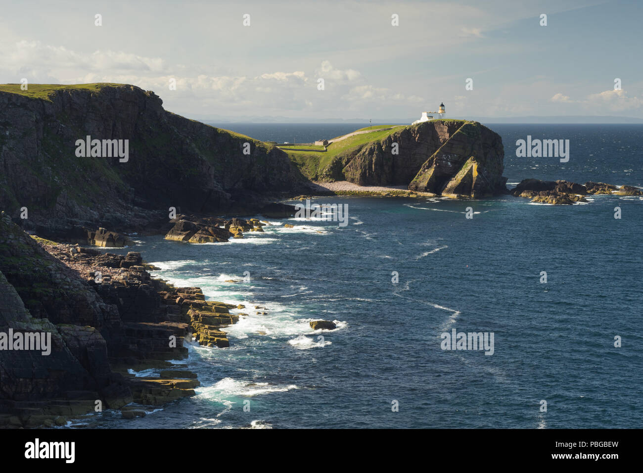 Stoer Head Lighthouse on the far West Coast of Scotland in Assynt Stock Photo