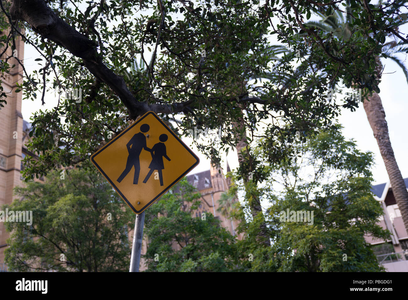 school zone, Beware of people or children crossing the street, Road symbol signs in park Stock Photo