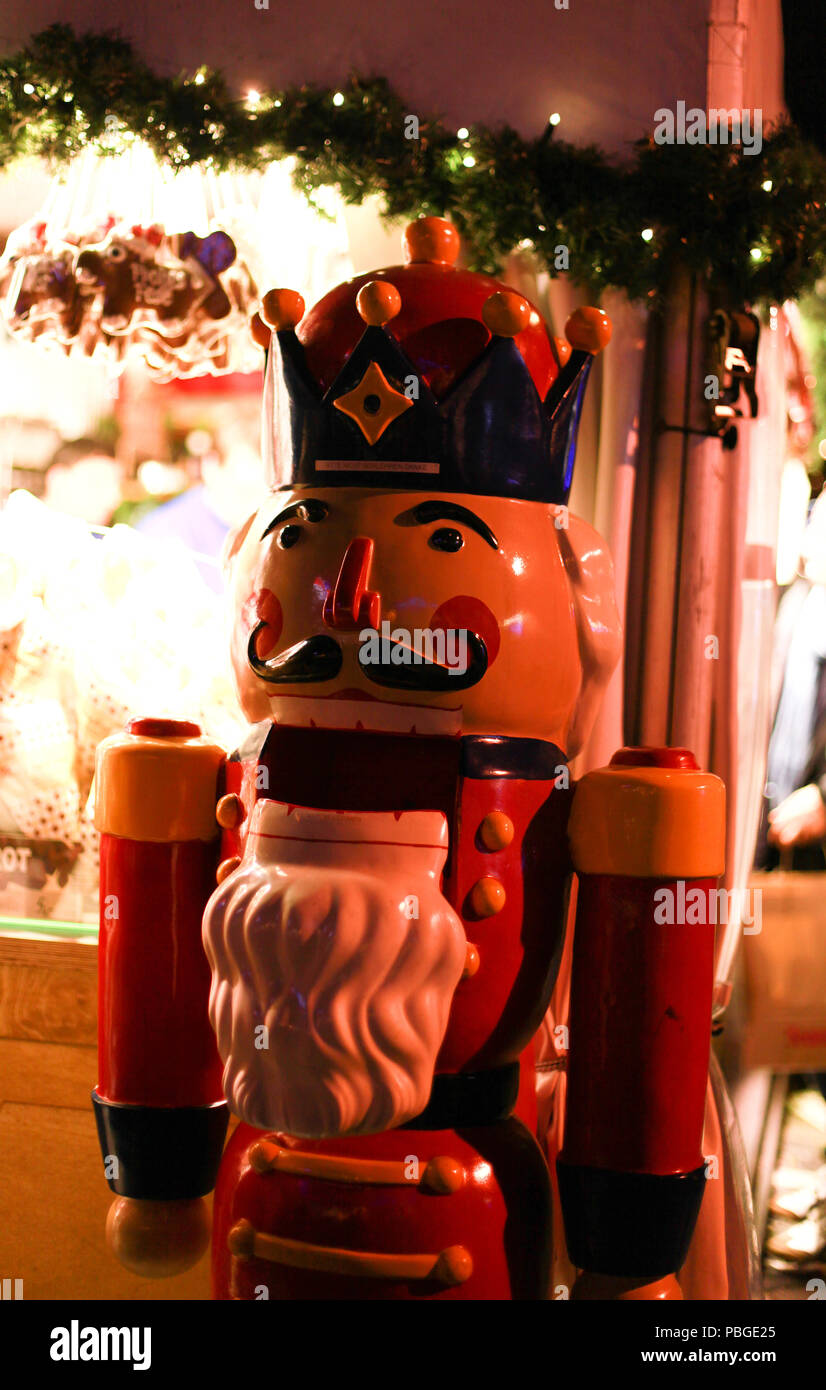 large nutcracker at european christmas market standing beside an illuminated christmas stall stock image - Large Toy Soldier Christmas Decoration large nutcracker at european christmas market standing beside an illuminated christmas stall stock image - Large Toy Soldier Christmas Decoration