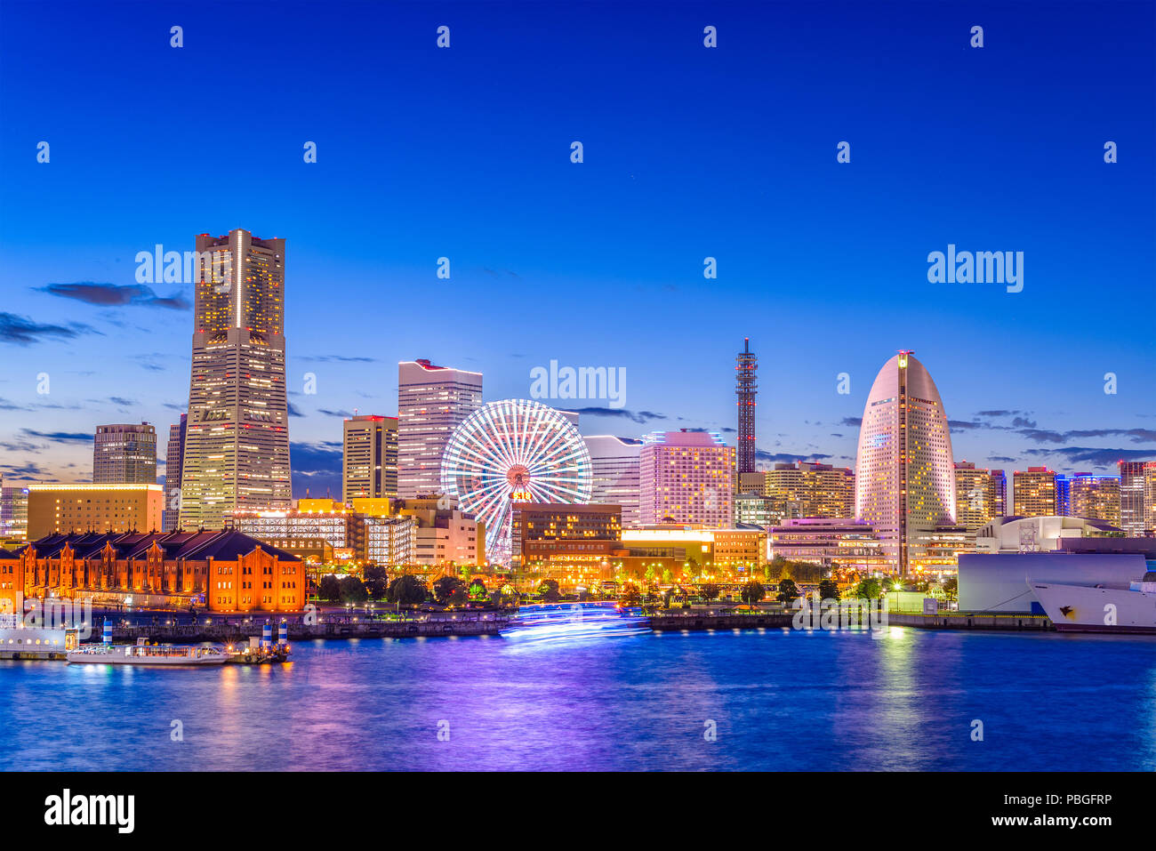 Yokohama, Japan city skyline from the bay at twilight. Stock Photo