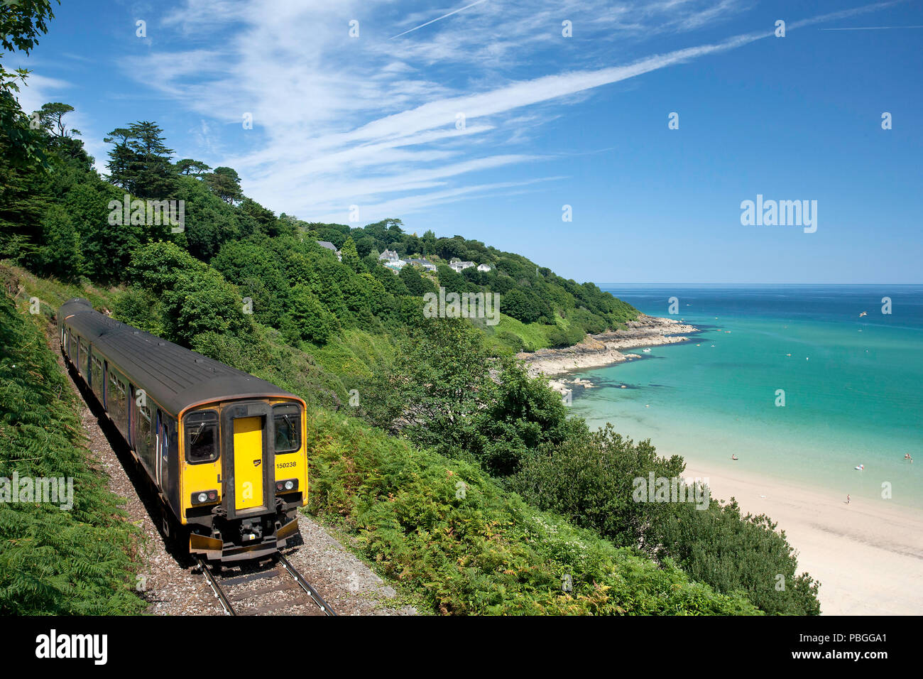 The Train to St Ives, Cornwall passes the beach of Carbis Bay, the