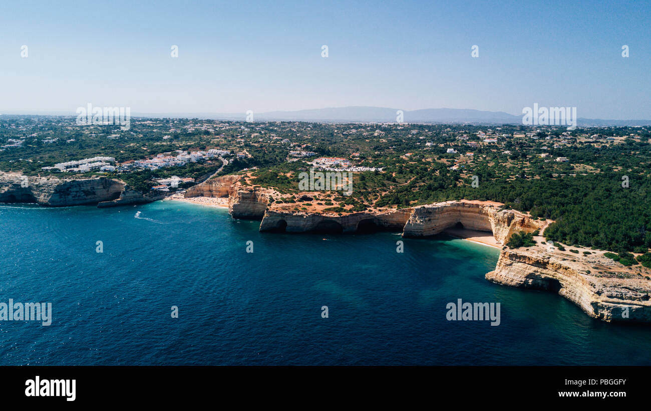 Beautiful rocks and cliff beaches of Portugal coastline from above ...