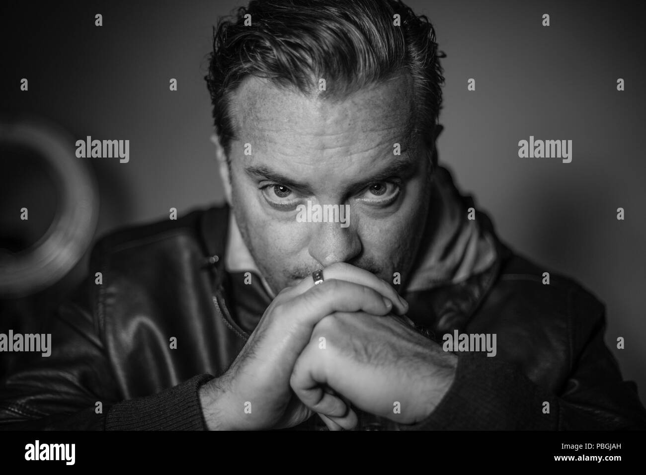 Old man in leather jacket hi-res stock photography and images - Alamy