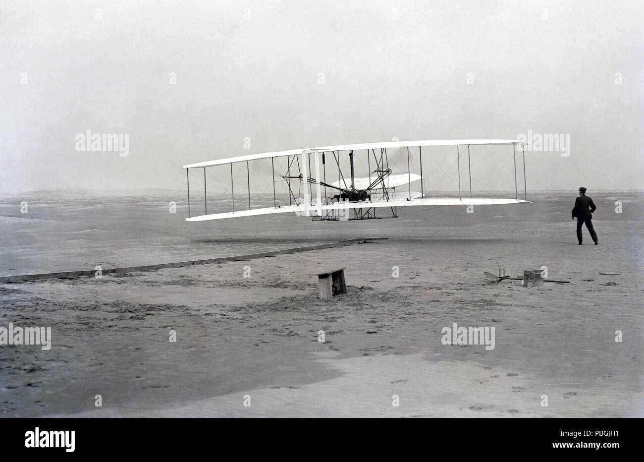 On December 17, 1903, at 10:30am at Kitty Hawk, North Carolina, this airplane arose for a few seconds to make the first powered, heavier-than-air controlled flight in history. The first flight lasted 12 seconds and flew a distance of 120 feet. Orville Wright piloted the historic flight while his brother, Wilbur, observed. The brothers took three other flights that day, each flight lasting longer than the other with the final flight going a distance of 852 feet in 59 seconds. This flight was the culmination of a number of years of research on gliders. Stock Photo