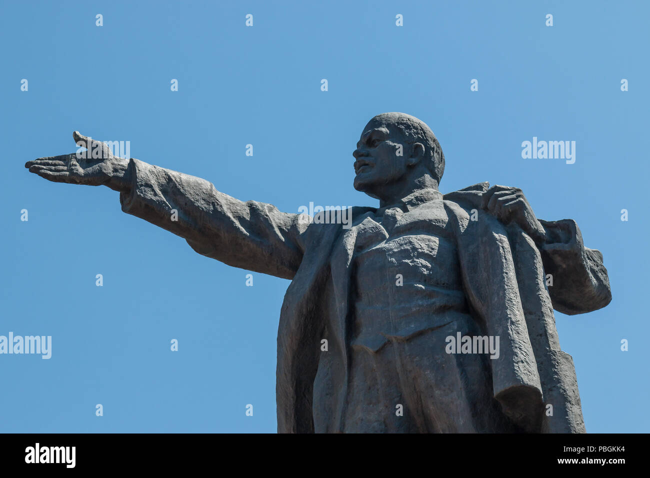Statue of Vladimir Lenin (Vladimir Ilyich Ulyanov) standing behind Ala Too Square in Bishkek, the capital city of Kyrgyzstan. Stock Photo