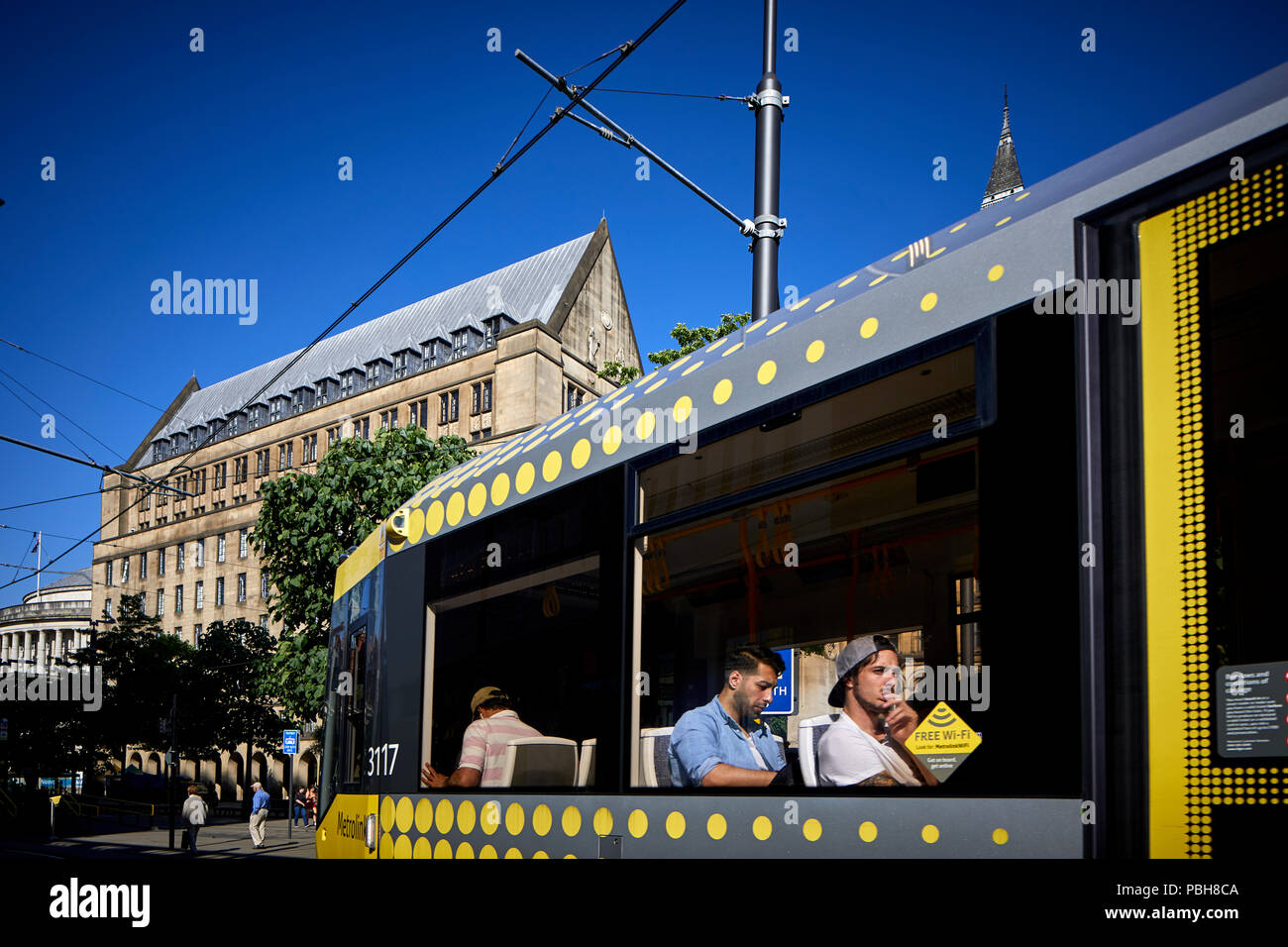 Metrolink tram at Peters Square, Town hall,   Manchester city centre Stock Photo