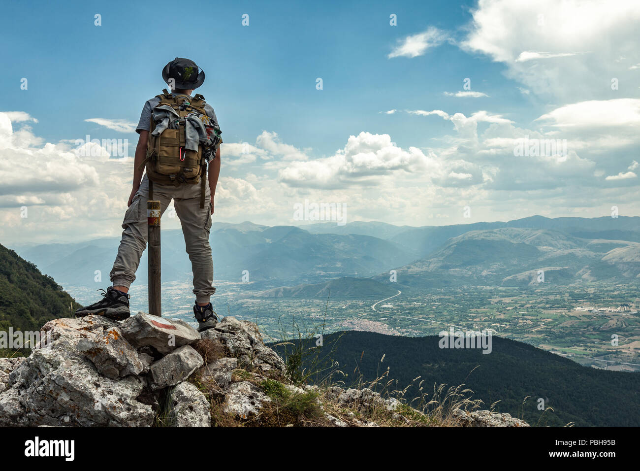Young trekker in  the mountain top, Abruzzo Stock Photo
