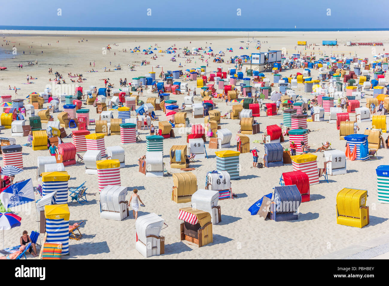 Many colorful tents and beach chairs on Borkum island in Germany Stock Photo