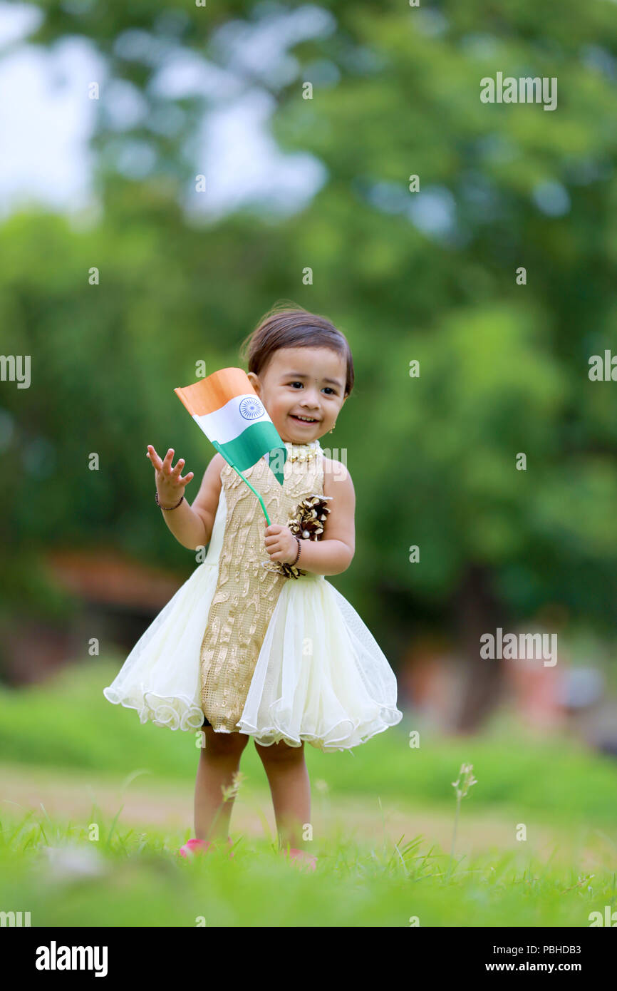 Indian Girl Holding An Indian Flag Stock Photos & Indian Girl Holding