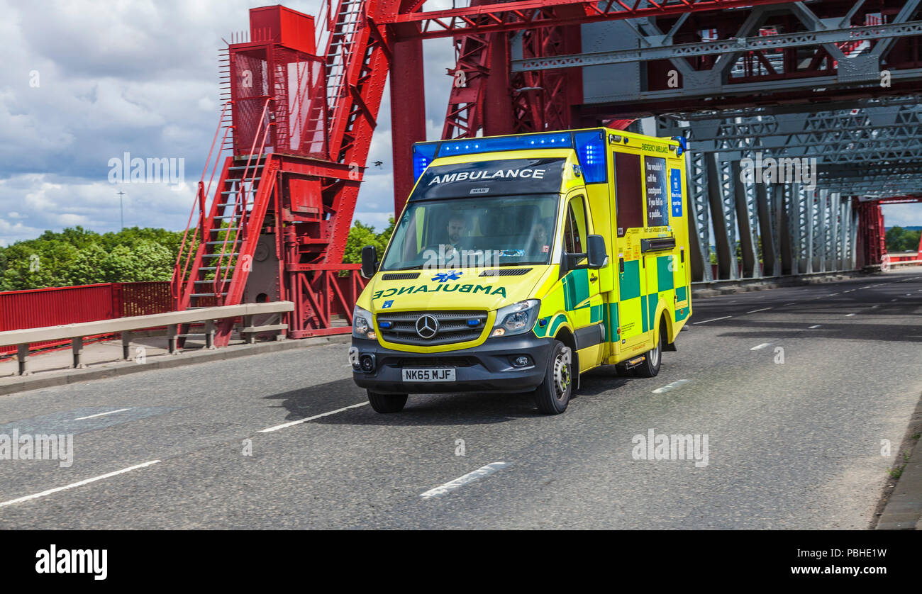 An ambulance on an emergency call out speeds across Newport Bridge ...