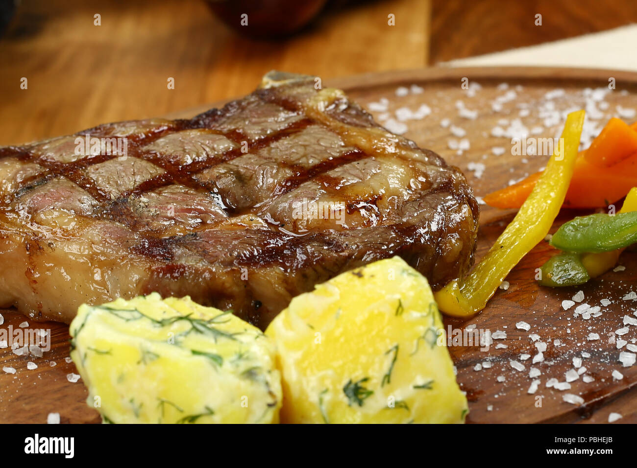 rib eye steaks cooked on a grill Stock Photo Alamy