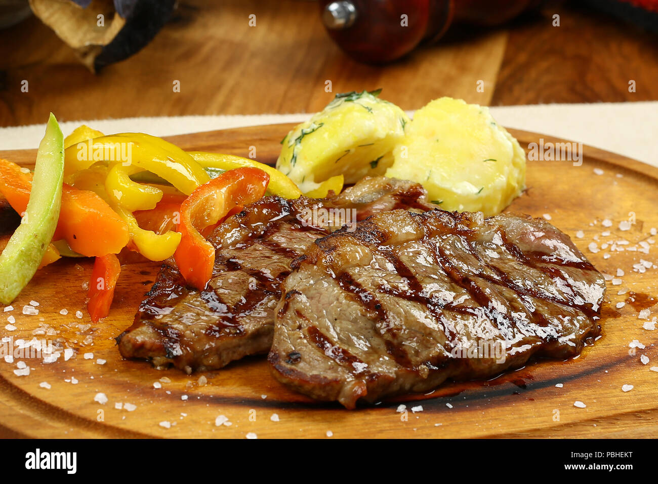rib eye steaks cooked on a grill Stock Photo Alamy