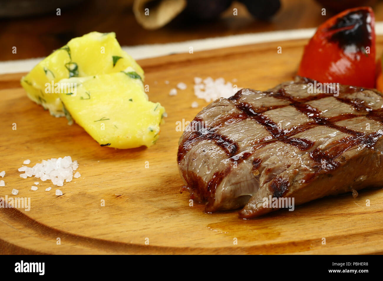 rib eye steaks cooked on a grill Stock Photo Alamy