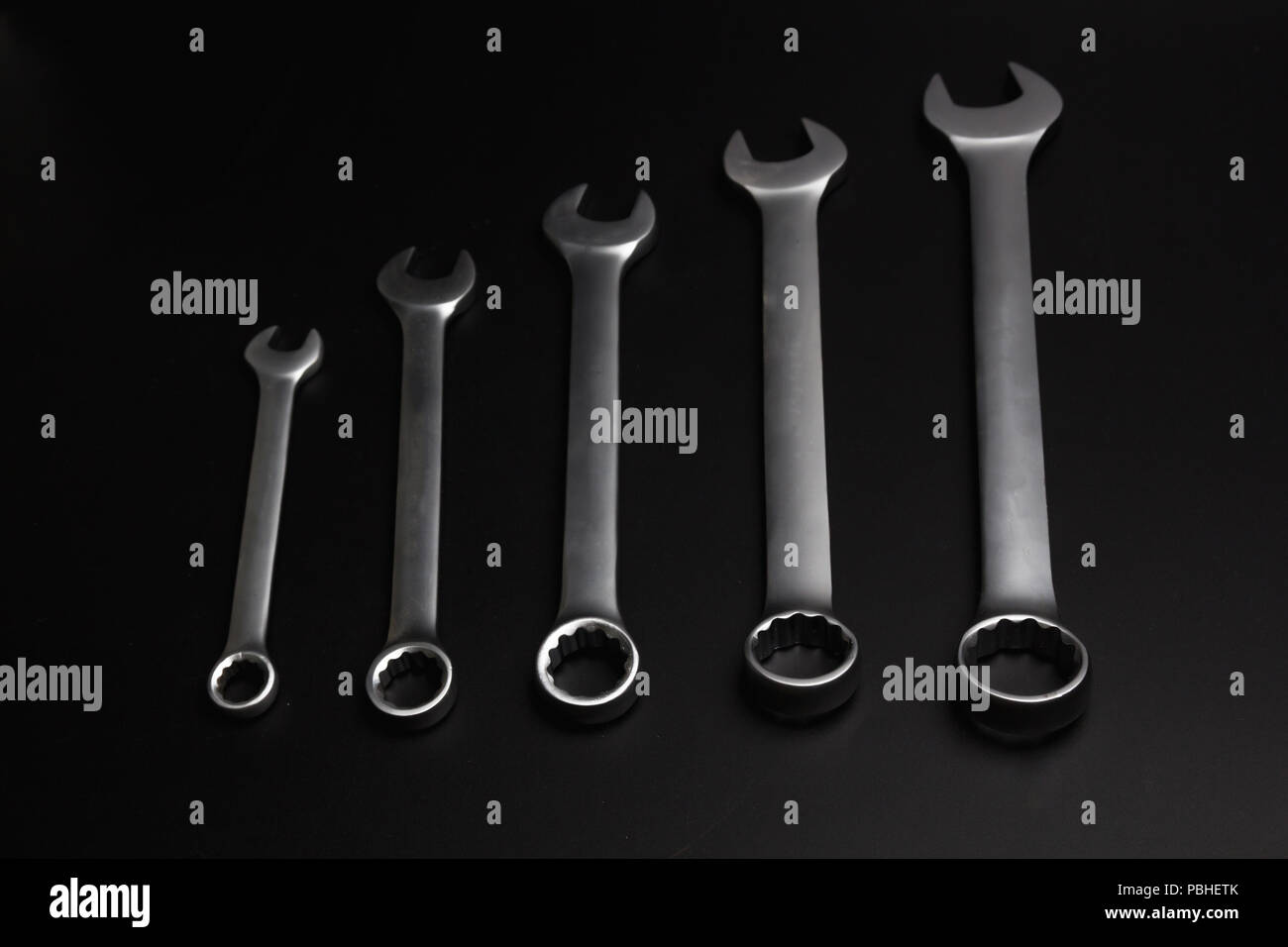 The wrench steel tools for repair on black background. Stock Photo