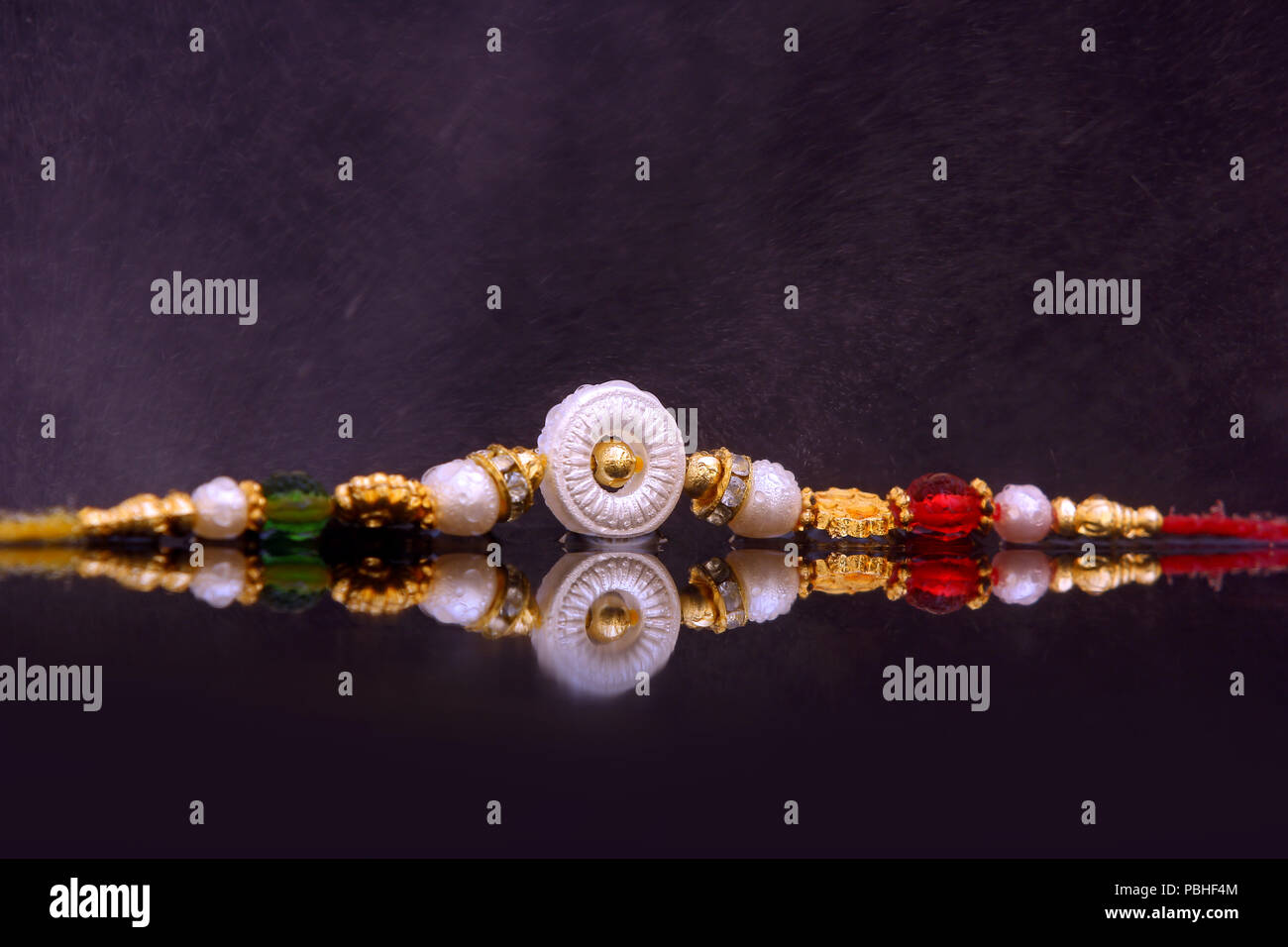 indian festival raksha bandhan , Rakhi on black background Stock Photo -  Alamy