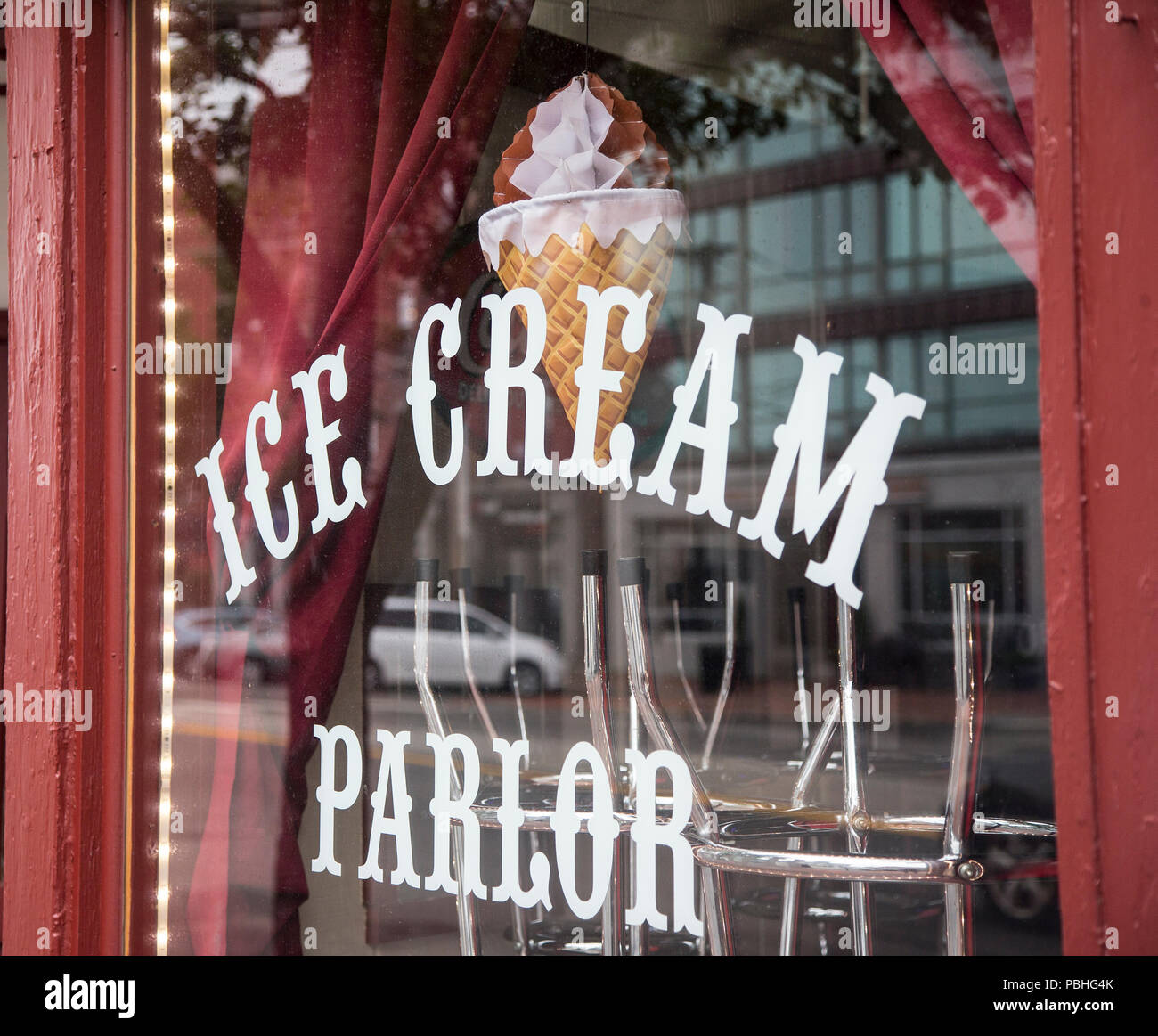 Ice cream parlor sign in a storefront window in Portland, Maine Stock