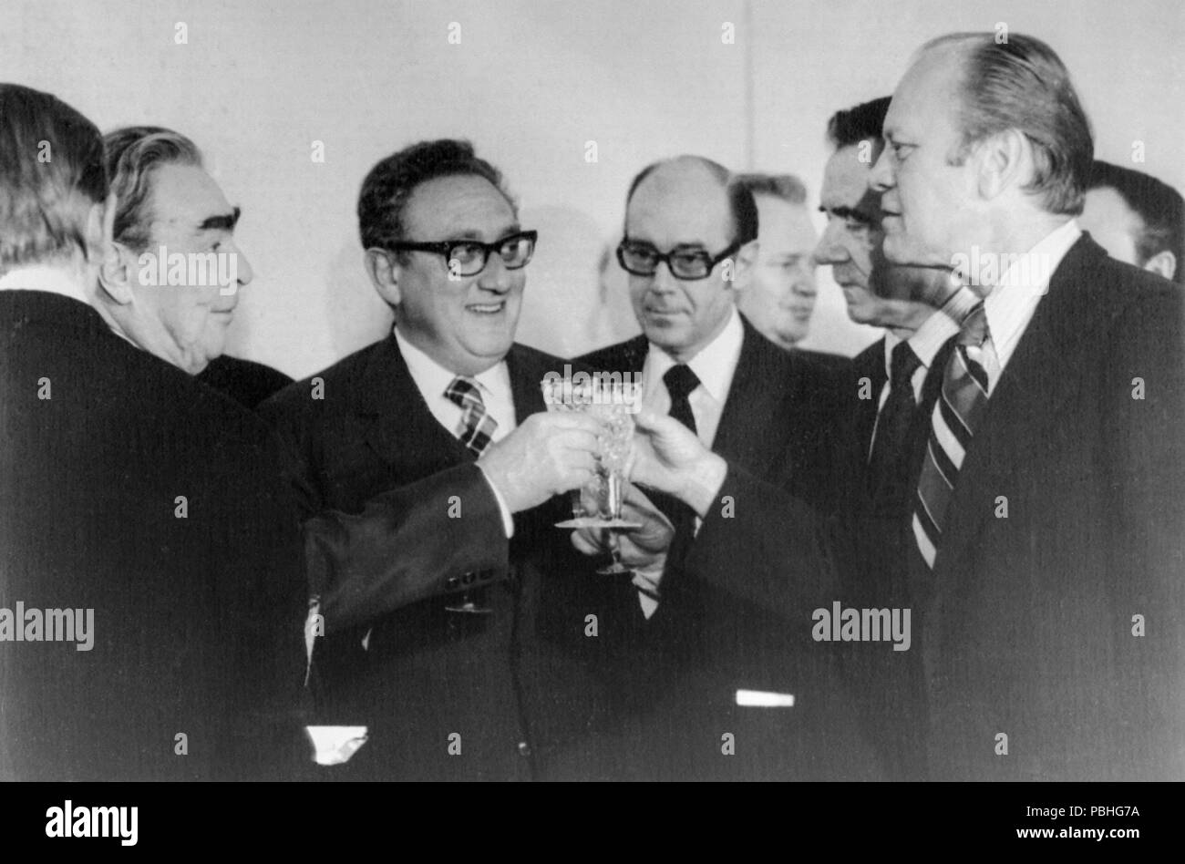 24th November 1974. Vladivostok, USSR. U.S. President Gerald Ford and Soviet Communist party Chief Leonid Brezhnev toast after signing agreement on guidelines for a treaty to limit offensive strategic nuclear weapons. Brezhnev, Secretary Of State Henry Kissinger, Soviet Ambassador to U.S. Anatoly Dobrynin, Soviet Foreign Minister Andrei Gromyko, and President Ford. Stock Photo