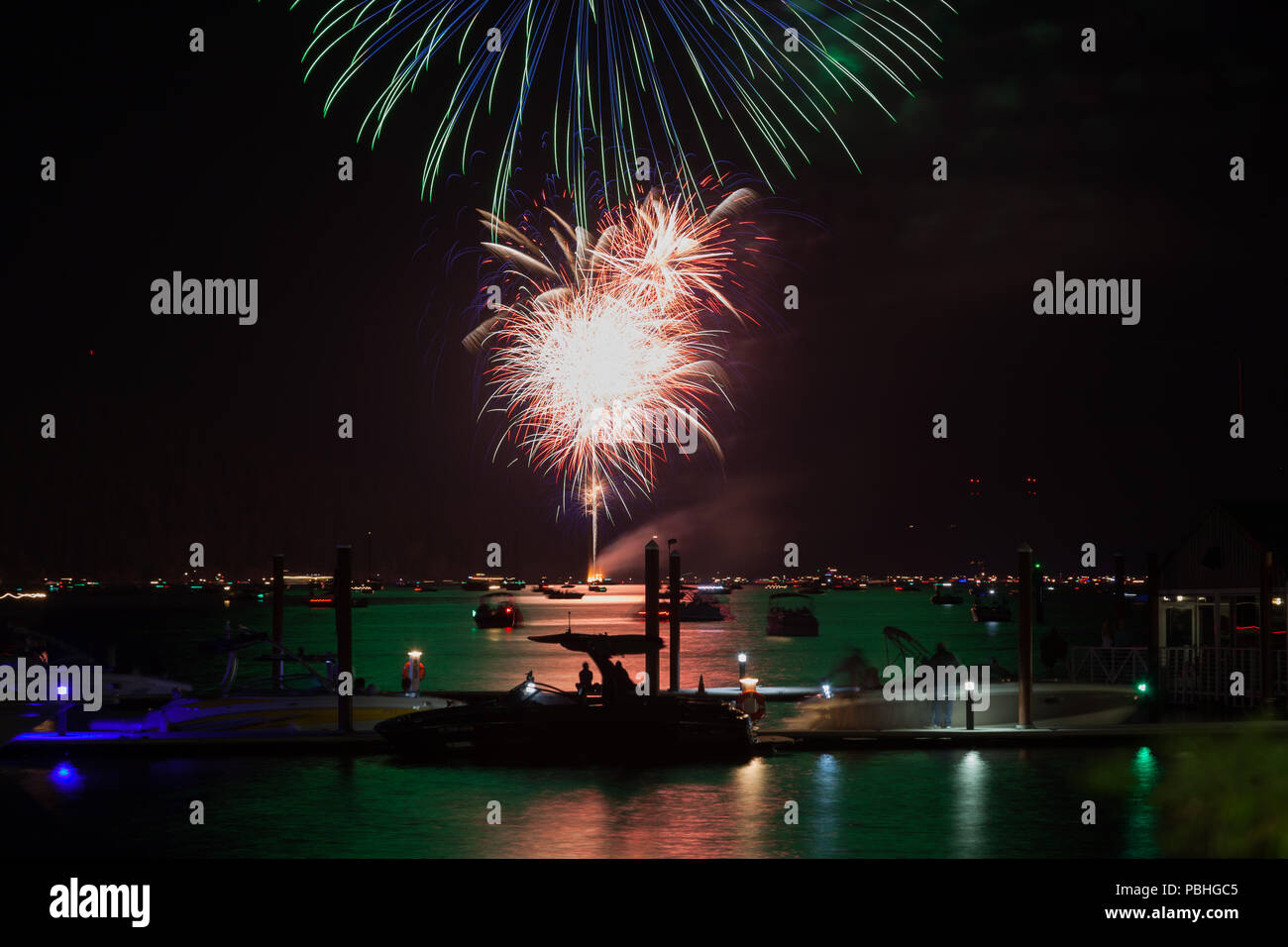 Beautiful Fourth of July fireworks glowing over Lake Coeur d'Alene in