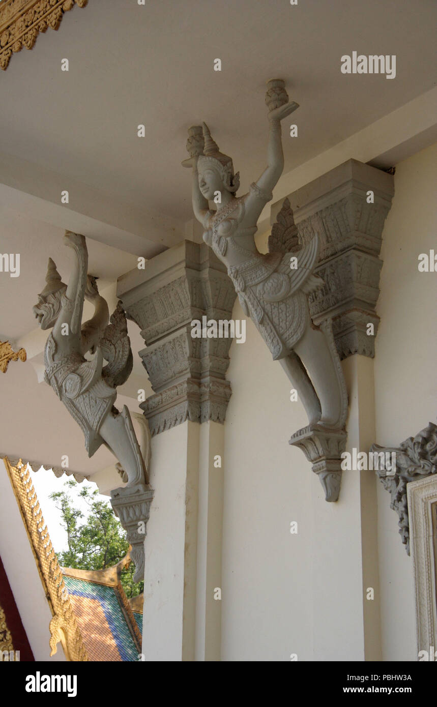 Two Men Sitting on Steps Outside Door with Gold Detail, Royal Palace, Phnom Penh, Cambodia, Stock Photo