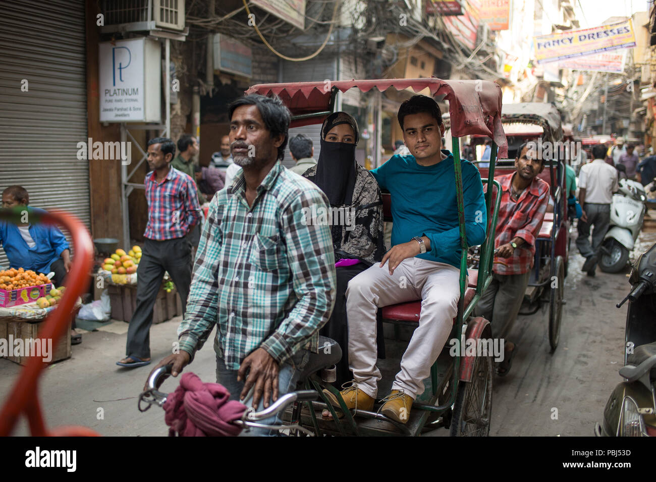 Tourists on the rickshaw, New Dheli, India, Asia Stock Photo