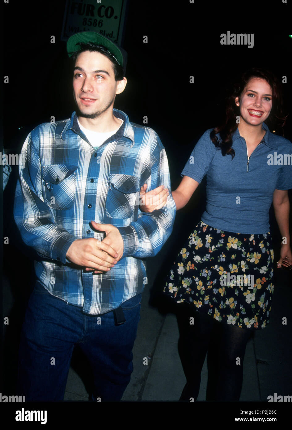 LOS ANGELES, CA - APRIL 2: (L-R) Rapper Adam Horovitz of the Beastie Boys, aka Ad-Rock and wife actress Ione Skye on April 2, 1992 in Los Angeles, California. Photo by Barry King/Alamy Stock Photo Stock Photo