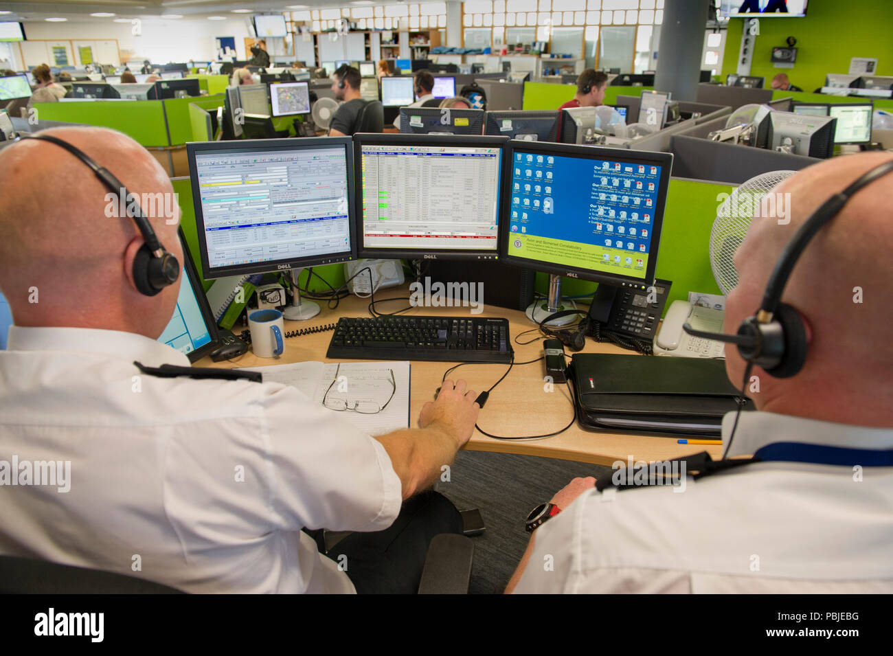 Avon & Somerset Police headquarters,showing the Communications (Comms) Room,where all operations are controlled,with duty force incident manager,left Stock Photo