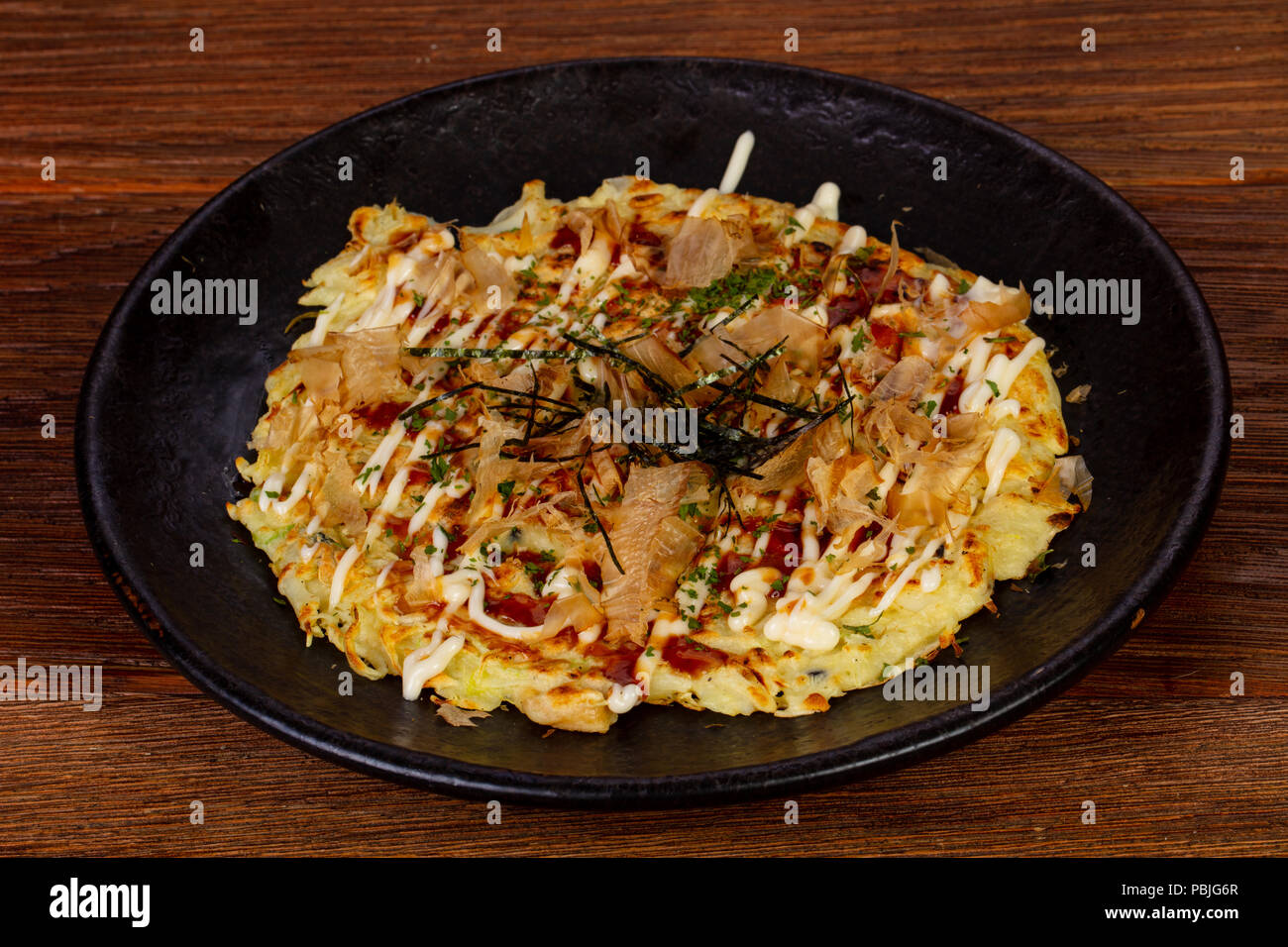 Japanese pizza with seafood and fish Stock Photo Alamy