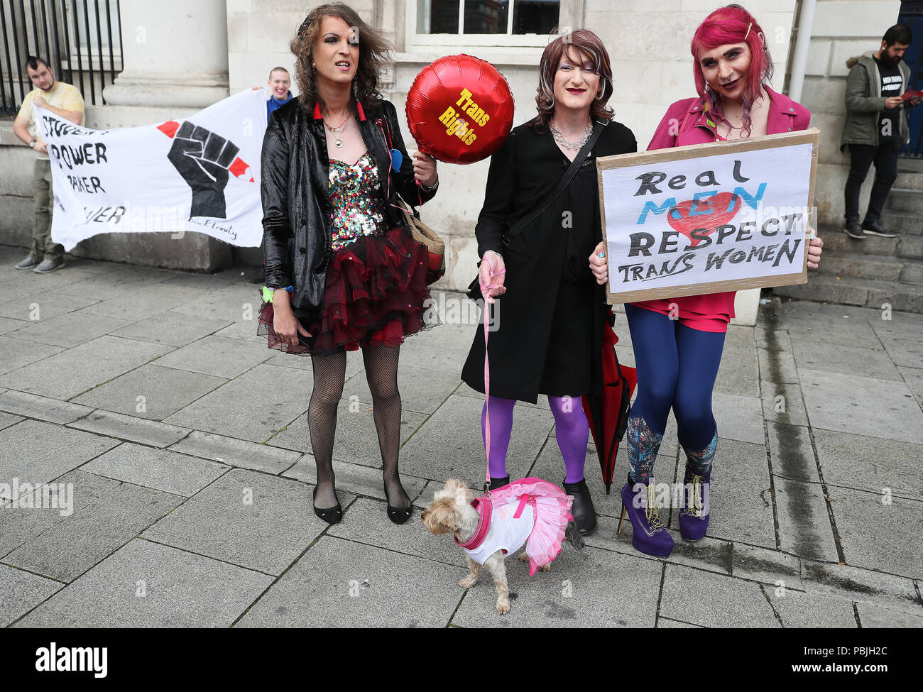 Nicollette Crowe (left) Ray Leonard (centre) and Sonia Kolasinska arrive to take part in a Trans Pride March in Dublin's city centre. Stock Photo