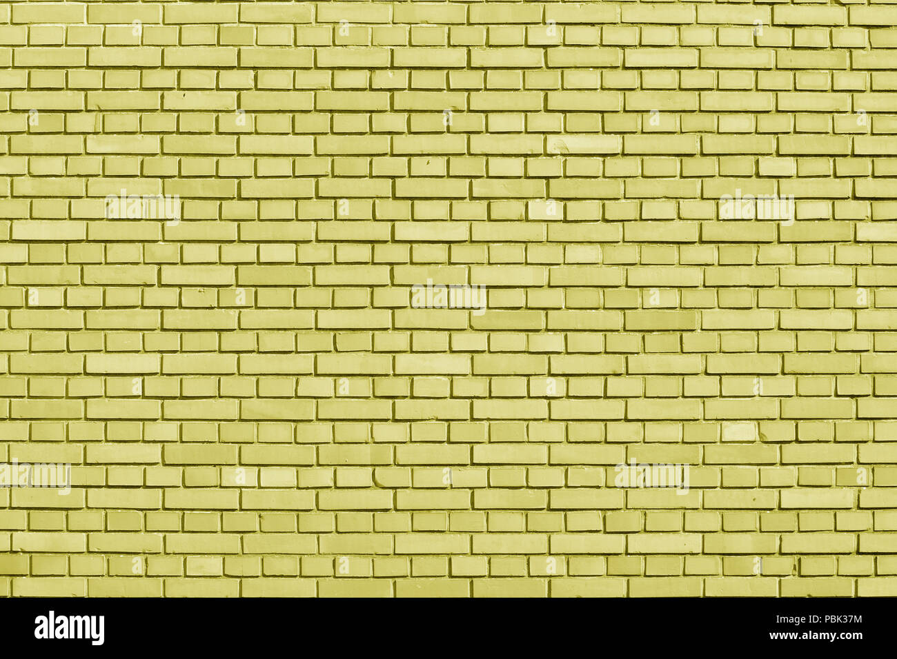 Limelight colored brick wall background Stock Photo