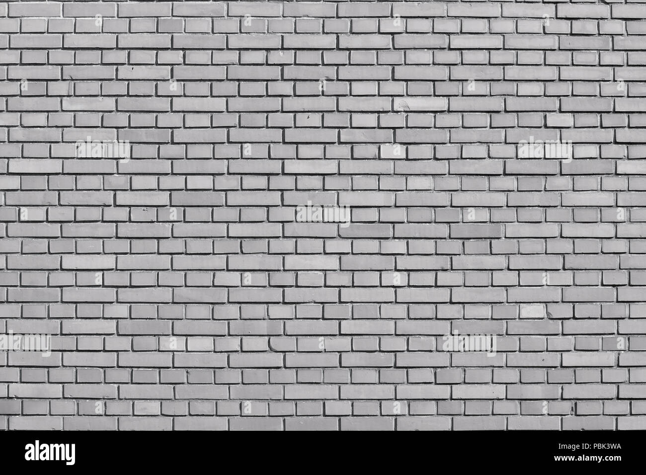 Quiet gray colored brick wall background Stock Photo