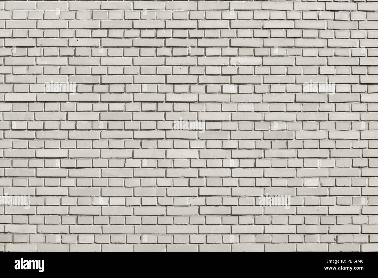 Tofu colored brick wall background Stock Photo
