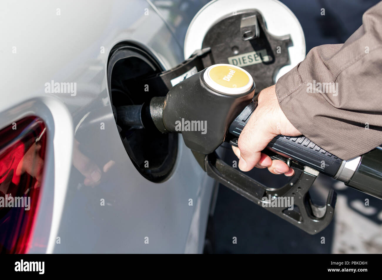 car refueling diesel pump at petrol station Stock Photo