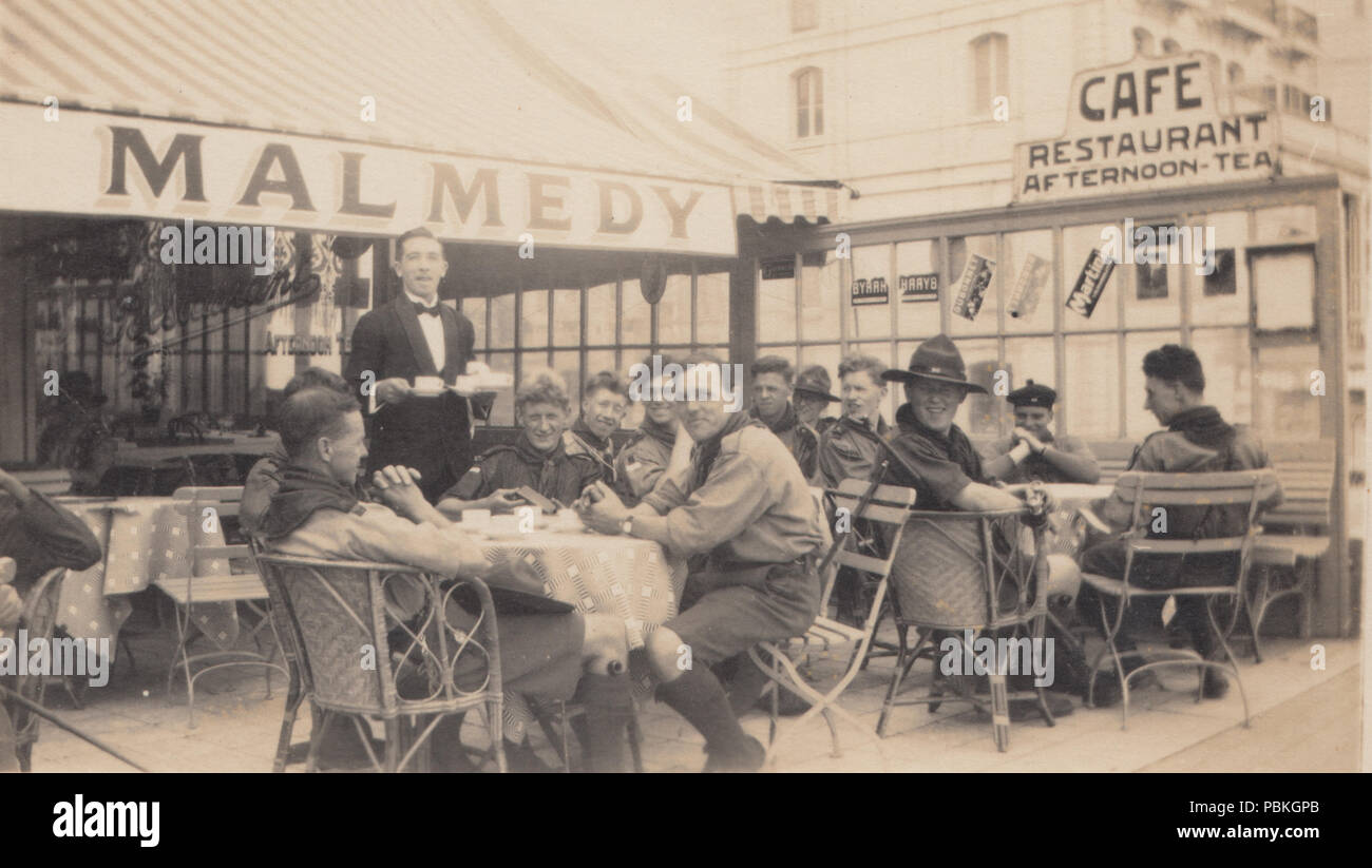 Vintage Photograph of The Café / Restaurant Called Malmedy. Boy Scouts Being Served. Stock Photo