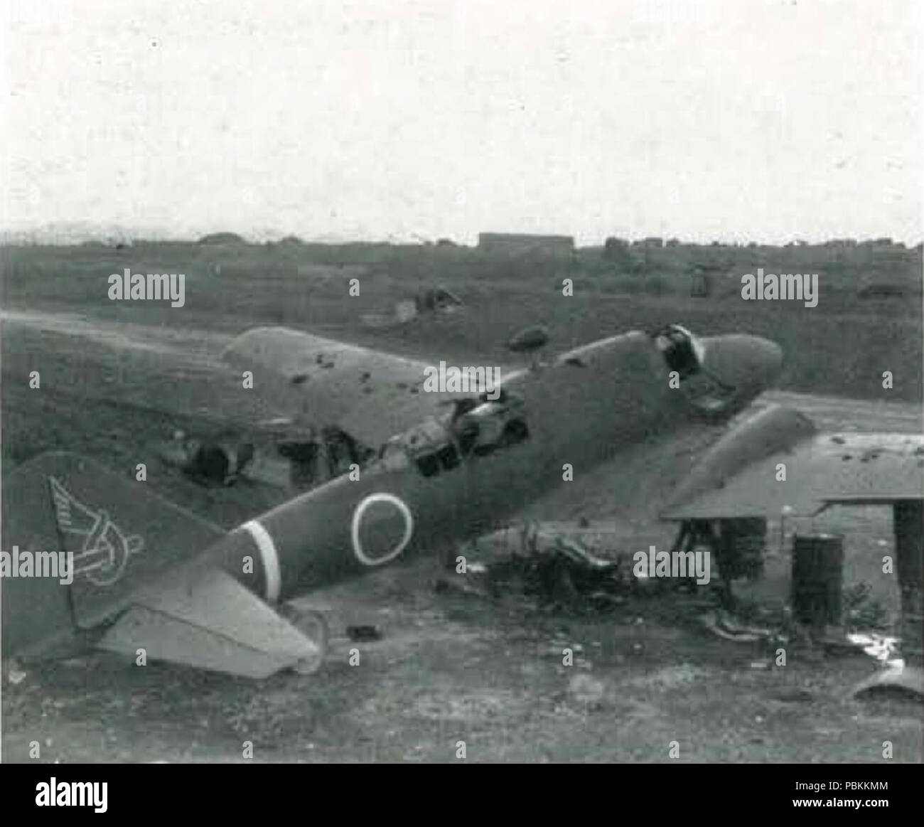 Abandoned Mitsubishi Ki-46 II on Okinawa circa in June 1945. Stock Photo