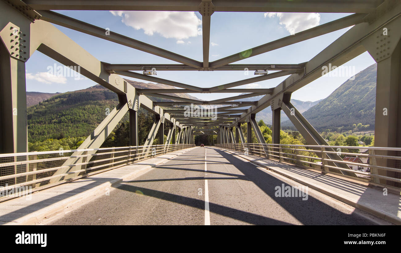 The Ballachulish steel truss bridge carrying the A82 trunk road across Loch Leven sea loch near Glen Coe in the West Highlands of Scotland. Stock Photo