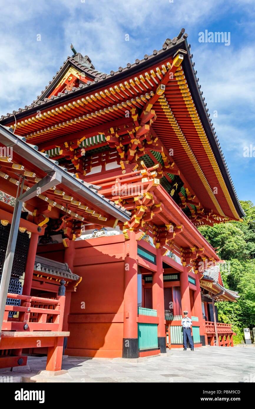 Ornate carvings painted bright red and yellow in the Hase-dera Buddhist Temple, Kamakura near Tokyo, Japan. Stock Photo