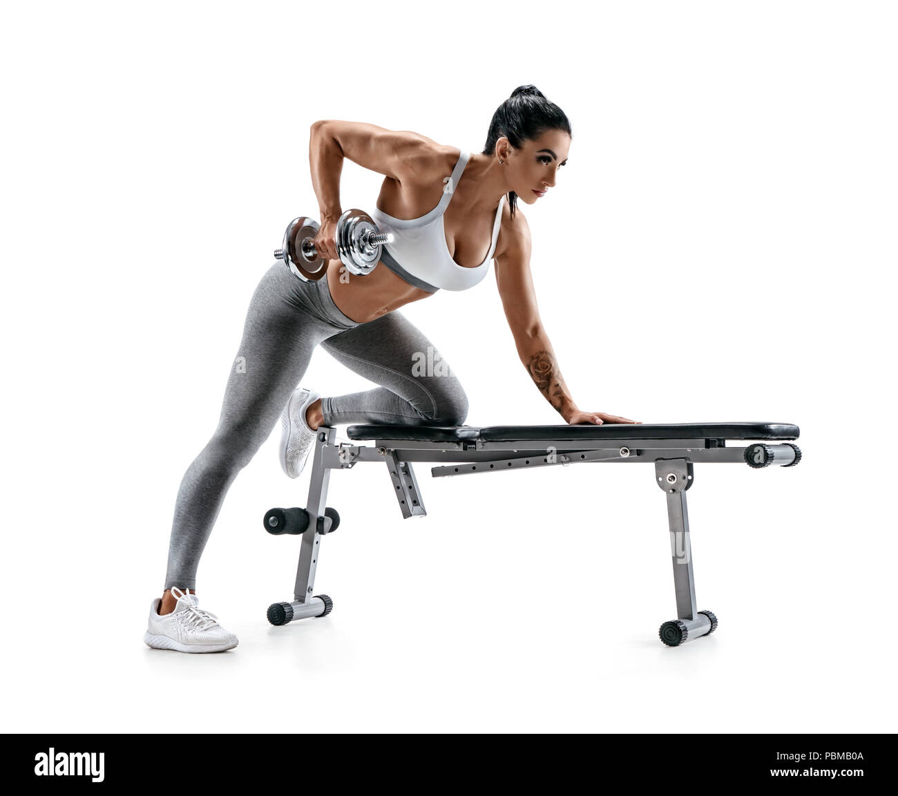 Dumbbell female pose hi-res stock photography and images - Alamy