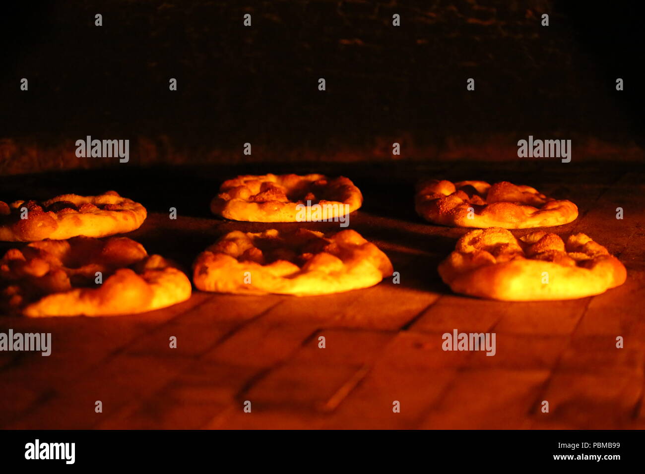 Turkish bread in wood fired oven Stock Photo Alamy